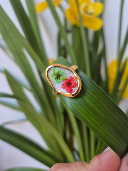 Anillo ajustable ovalado dorado flores